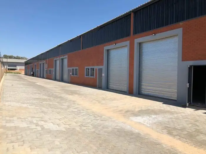 Factory row with roller doors