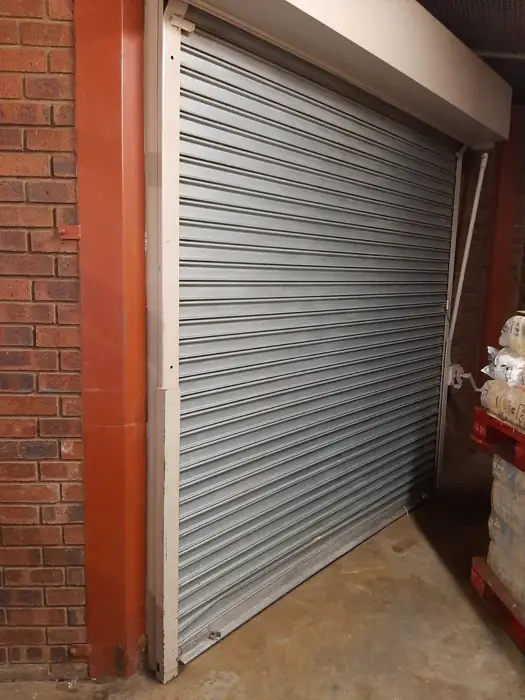 Galvanised shop roller shutter