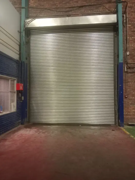 Loading bay roller shutter