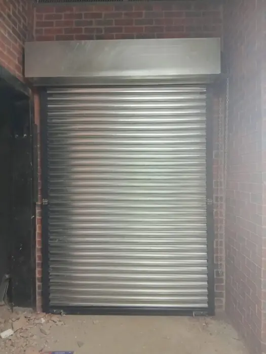 Roller shutter with hood box